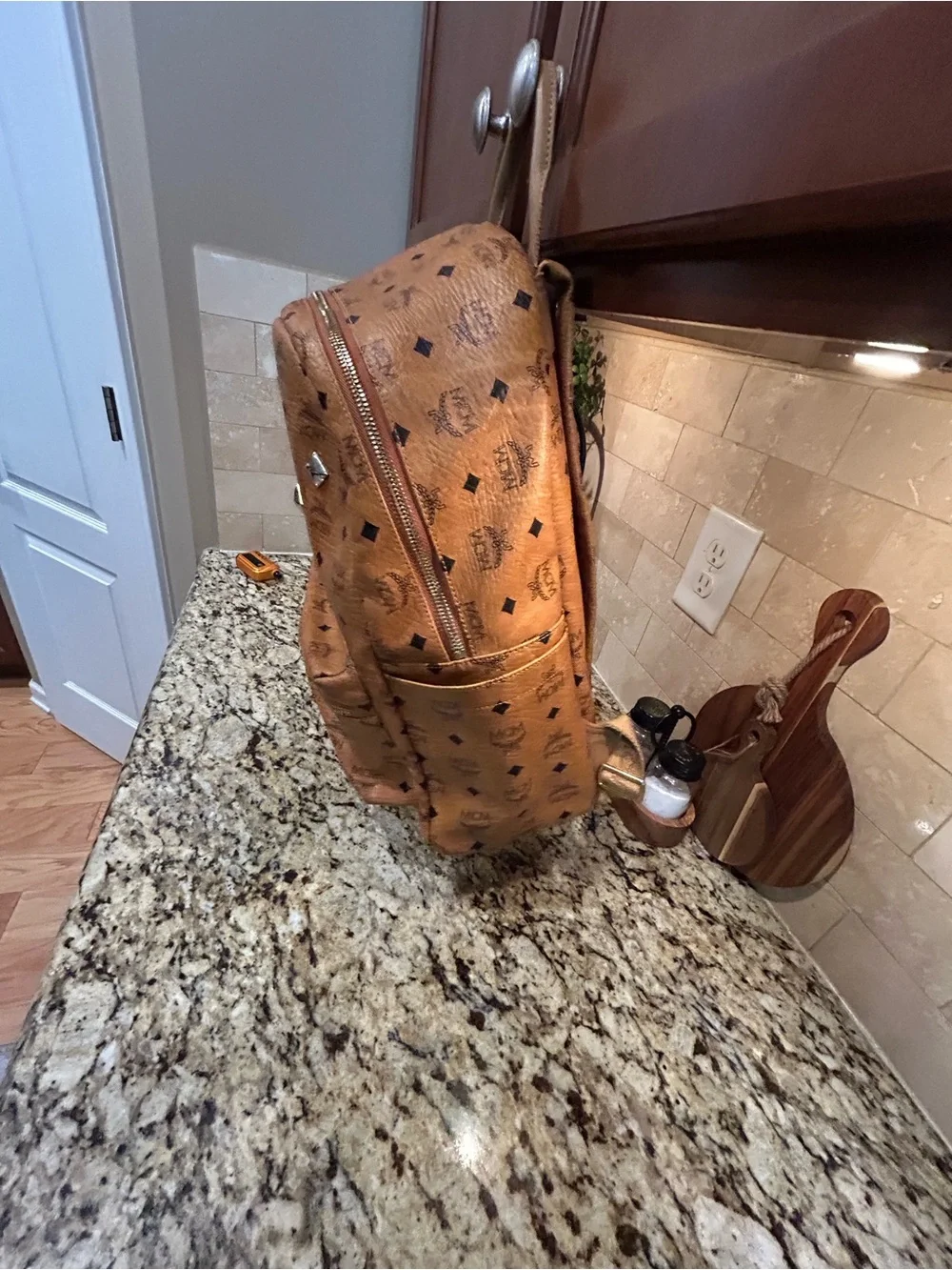 MCM Cognac Visetos Backpack Large with mcm bone bag charm and coa card.